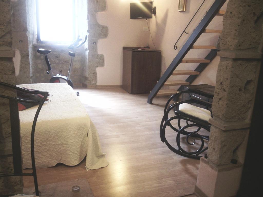 4 Assi Lejlighed Pitigliano Værelse billede